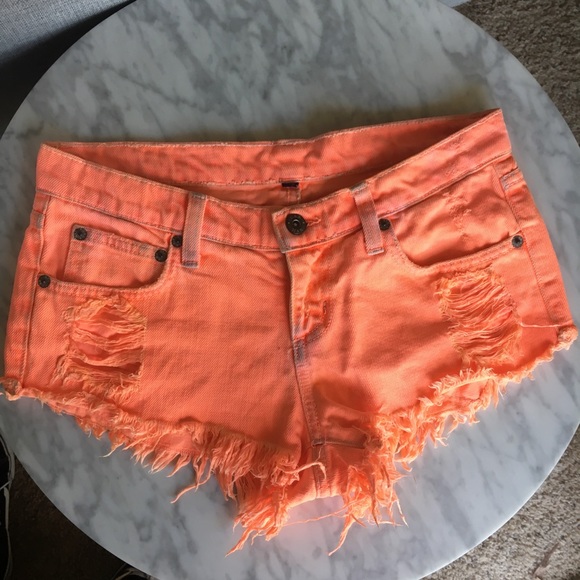 neon orange denim shorts